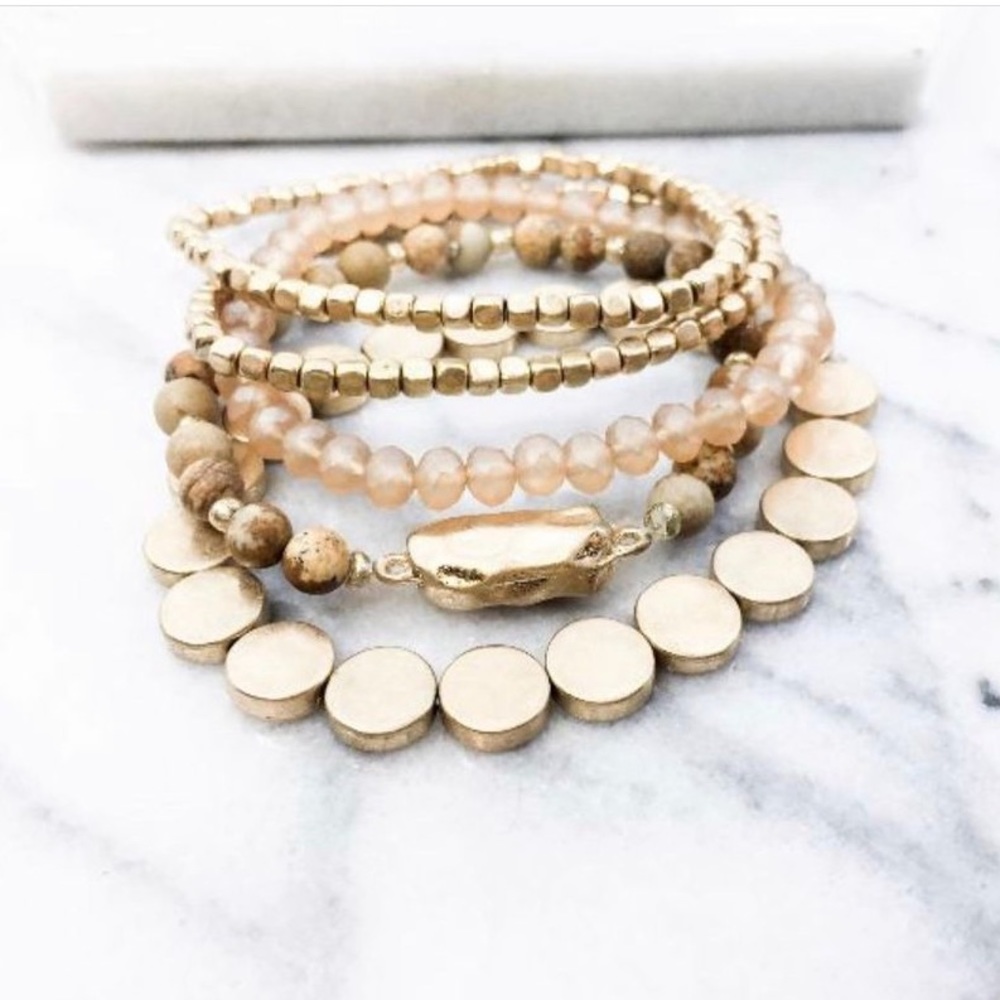 Brown and gold five strand bracelet